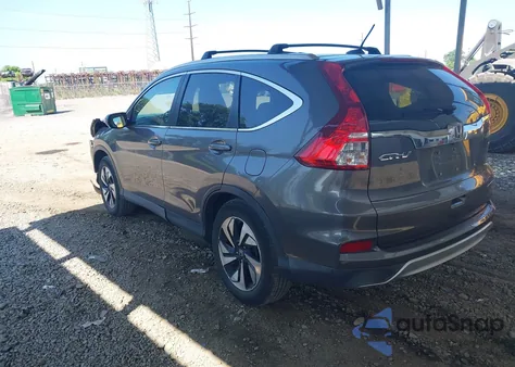 2016 Honda Cr-V Touring from USA, damaged, VIN 5J6RM4H90GL033671